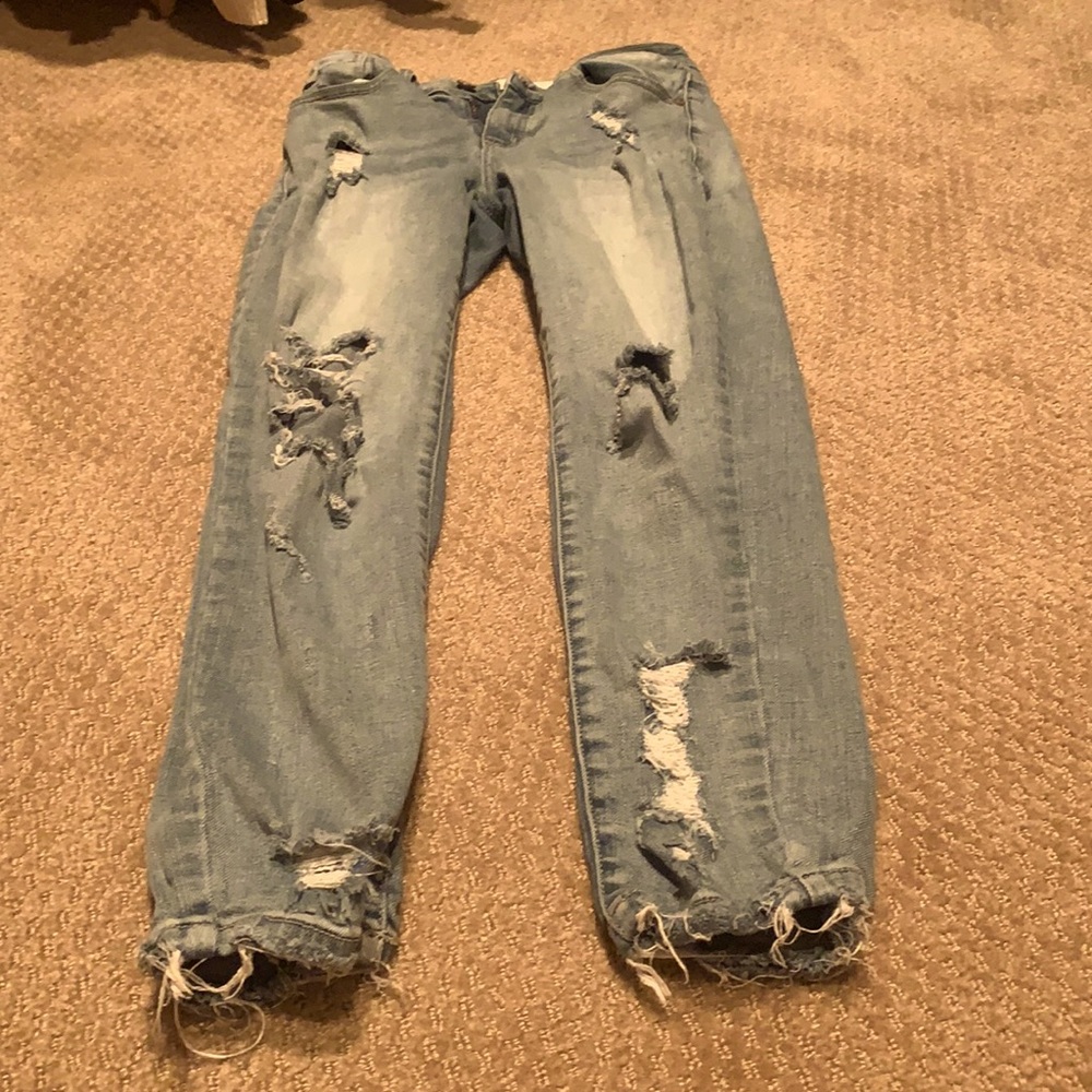 Light blue ripped jeans